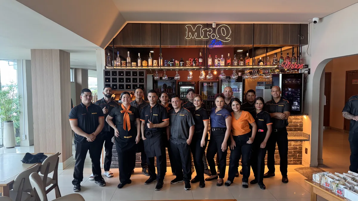 Equipe do restaurante Mr. Quilo